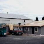 Volunteers work on the senior centers addition in 2002 a larger main room, a brighter art room, computer classroom, multi-purpose classroom, health services room, storage areas, new restrooms, café dining room, directors office and a new front-desk lobby.