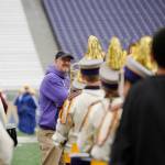 Vern Fosket, Sequim High School band director, keeps an eye on his students at the 2015 Husky Band Day in Seattle. Sequim Gazette file photo by Michael Dashiell