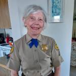 Annie Gilbert models a uniform she wore for while serving the Humane Society. Submitted photo