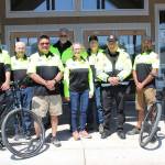 Bike patrol volunteers for the Clallam County Sheriffs Office include, from left, Jim Mraz, Guy Cranor, Buddy Bear, John Toppenberg (in back), Deanne Lachner, Alan Barnard (in back), Gary Gertig and Matt Aston. Photo courtesy of Clallam County Sheriffs Office