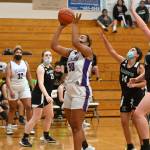 Sequim senior Jayla Julmist, center, goes to the basket for two of her game-high 16 points in the Wolves 68-8 win over visiting Klahowya on May 25. Sequim Gazette photo by Michael Dashiell