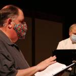 Steve Rodeman directs the cast of Dr. Watsons Workshop, with actor Joel Hoffman in the background. Photo courtesy of Olympic Theatre Arts