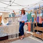 Shelly Weber of PNW GIRL brings her wall hangings, hand-woven plant holders and other wall art to the Sequim Farmers & Artisans Market each Saturday. Photo by Emma Jane EJ Garcia