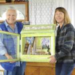 Eva Kozun and Gayle Selby hope the community keeps creating art for Free Little Art Galleries coming to the Sequim area this summer. Selby sent an article to Kozun in January that led the mixed-media artist to create four galleries with one posted so far at Dungeness Dandelion Botanical Company, 4681 Sequim Dungeness Way. Sequim Gazette photo by Matthew Nash