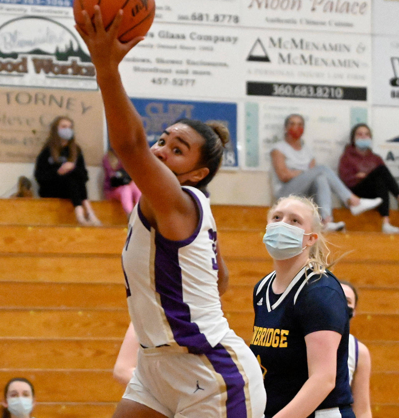 Sequims Jayla Julmist snags a rebound in the Wolves 66-17 postseason win over Bainbridge in June 5. Sequim Gazette photo by Michael Dashiell