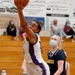 Sequims Jayla Julmist snags a rebound in the Wolves 66-17 postseason win over Bainbridge in June 5. Sequim Gazette photo by Michael Dashiell