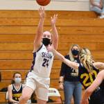Sequims Malory Morey puts up a shot as she and the Wolves take on Bainbridge in a postseason opener on June 5. The Wolves won, 66-17. Sequim Gazette photo by Michael Dashiell
