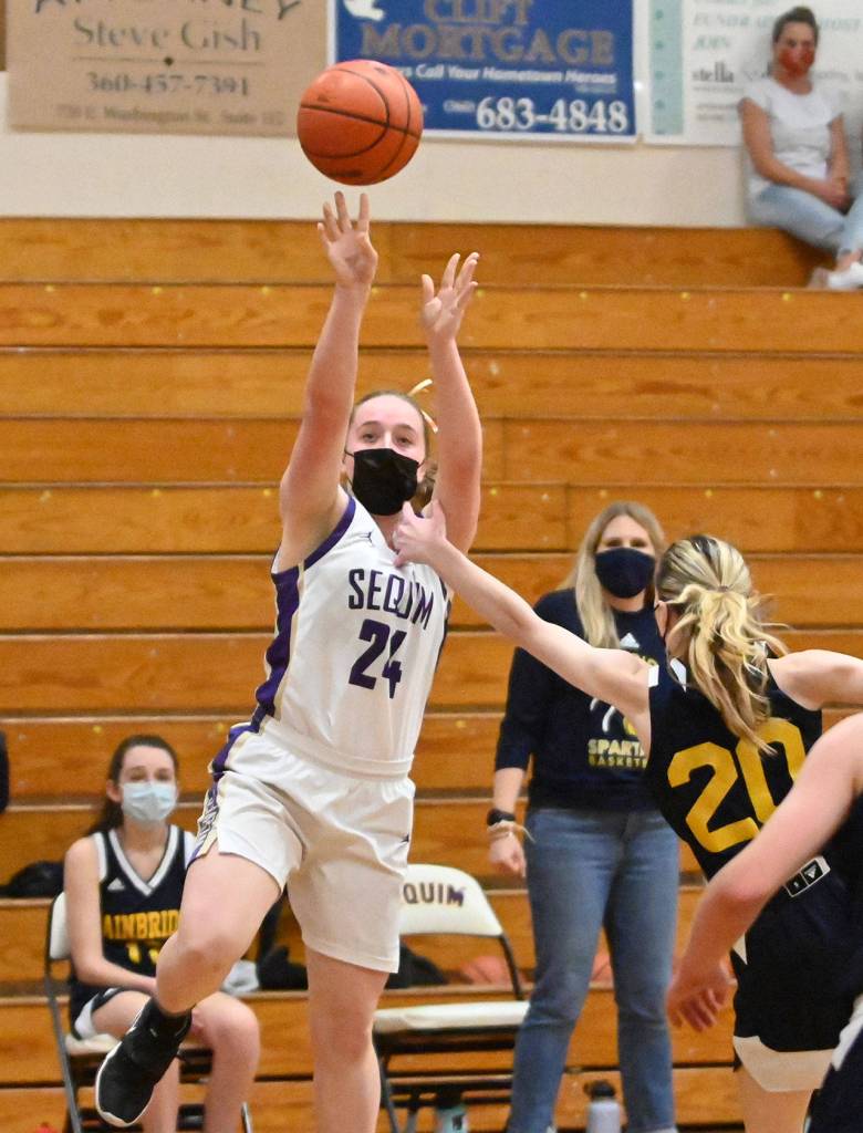 Sequims Malory Morey puts up a shot as she and the Wolves take on Bainbridge in a postseason opener on June 5. The Wolves won, 66-17. Sequim Gazette photo by Michael Dashiell