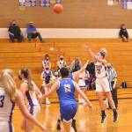 Sequims Kalli Wiker sinks one of her school record nine three-pointers in a 71-39 win over Olympic on June 4. Photo by Wendy Morey