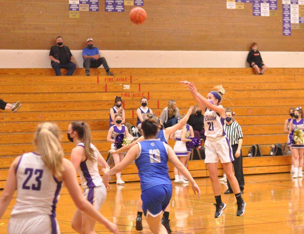 Sequims Kalli Wiker sinks one of her school record nine three-pointers in a 71-39 win over Olympic on June 4. Photo by Wendy Morey