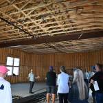 Dungeness River Audubon Center director Powell Jones, background, helps guide a tour of the centers renovation to Sequim Sunrise Rotary Foundation board members in April. River center representatives recently announced a $300,000 grant from the Sundlerland Foundation to help complete the expansion. Sequim Gazette file photo by Michael Dashiell