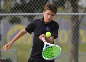 Sequim freshman Garrett Little, pictured here returning a shot against a North Mason foe on May 10, took the Olympic League title last week, going 4-0 in the tourney and 13-0 for the season. Sequim Gazette photo by Michael Dashiell