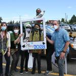 Fifth grade teachers Nathalie Maynock (far left), Ashley Kramer (second from left) and Aaron Reno (right) celebrate Greywolf Elementary fifth-graders Alex and Daniel Alokoa on the schools final in-person day on June 16. Sequim Gazette photo by Michael Dashiell