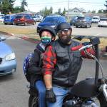 Greywolf Elementary fifth-grader Rhys Anglin, pictured here with Tommy Buck, enjoys a send-off at the schools final in-person day of instruction on June 16. Photo by Darcy Lamb
