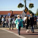 Suzi Morris of Sequim walks with a sign during a protest on Saturday in downtown Sequim recognizing Juneteenth, and condemning racism. We need keep sharing the message, thats what we can do, she said. We cant be quiet because thats just supporting it. Sequim Gazette photo by Matthew Nash