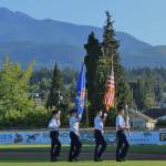 The Color Guard for Dungeness Composite Flight  The Civil Air Patrol (CAP) Unit of the Olympic Peninsula  presents the colors at a Lefties baseball game in Port Angeles in 2018. Pictured, from left are cadets (left to right) Carson Holt, Joe Benjamin, Madeline Patterson, and Jordan Hurdlow, all of Sequim. The CAP resumed in-person meetings and gather at 6:30 p.m. on Tuesdays at the William R. Fairchild International Airport meeting room, 1402 Fairchild Airport Road, Port Angeles. Submitted photo