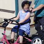 A Sequim student enjoys a ride on a newly-donated adaptive bicycle, donated by Rotary Club of Sequim. 
Rotary Club of Sequim
