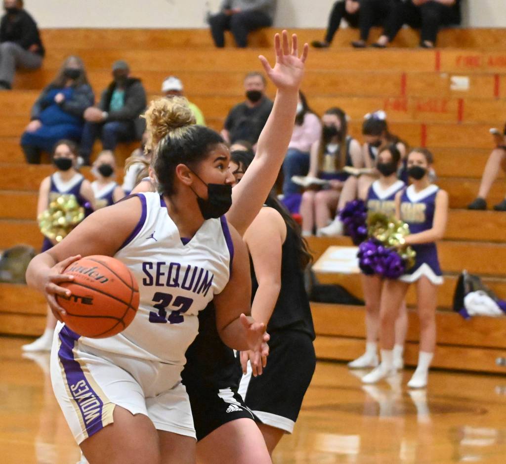 Sequim High sophomore Jelissa Julmist looks to score in Sequims 68-8 rout of Klahowya on May 25. She had 16 points and 12 rebounds in the game, and averaged 12.2 points, 8.2 rebounds nearly two assists in the Wolves 2020-2021 season. Sequim Gazette file photo by Michael Dashiell