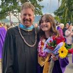 John Lorentzen visits with graduating senior Delaney Nucci after the Sequim High School 2021 graduation ceremony. Photo courtesy of Nucci family