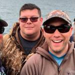 Abe Hawkins, Shawn Holmes, Tom Day and Brad Derting enjoy the Day of Honor with Salmon for Soldiers at the Port of Everett in 2019. The event saw more than 125 volunteer boaters and more than 400 veterans out fishing at the event, Mark Ostroot said. Photo courtesy of Sequim Chapter of Salmon for Soldiers