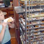 Emmaly Wood of Joyce, 10, arranges slices of blackberry pie for sale to the public during the 2018 Joyce Daze Wild Blackberry Festival in Joyce. The event is back on after a one-year hiatus in 2020 because of the COVID pandemic. File photo by Keith Thorpe/Olympic Peninsula News Group
