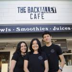 Guadalupe Arreguin, center, with her two children Nathalie and Sergio Alex, originally envisioned a food truck selling juices but the space opened up at their church Calvary Chapel Sequim so they opted to rent and open The Back Alley Cafe at 138 W. Washington St. Sequim Gazette photo by Matthew Nash