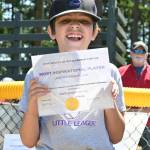 Justin Haberlack is all smiles after receiving his Sequim Little League prep division teams Most Inspirational Player Award on Saturday afternoon.