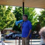 Gary Butler with the City of Sequims parks department thanks fellow staffers for their efforts and leadership in recent months during a rally on Monday in front of the Sequim Civic Center. Sequim Gazette photo by Matthew Nash