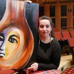 Ginny Holladay holds artwork for Olympic Theatre Arts production of Angel Street, set to stage Feb. 10-27, 2022. The artwork was created and donated by Ryoko Toyama. Submitted photo