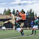 Peninsula goalkeeper Guilherme Avelar looks to make a save in a 2-1 Peninsula win over Highline in October 2012. Sequim Gazette file photo by Jay Cline