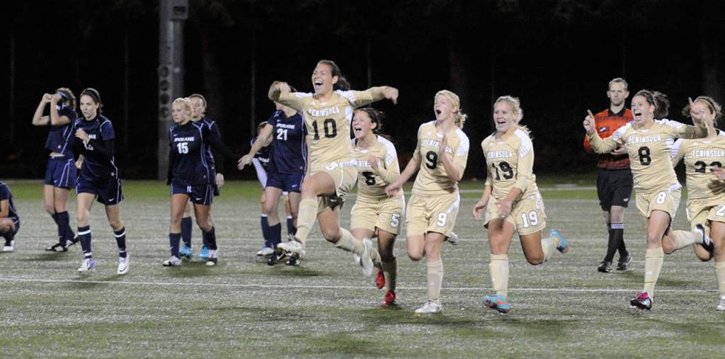 With tournament MVP Briana Afoa (10) leading the way, Peninsula Colleges womens soccer squad celebrates their first NWAACC championship in November 2012. The team, along with PCs womens 2013 team and 2012 and 2013 mens soccer teams, will be inducted into the schools Hall of Fame in September. Sequim Gazette file photo by Michael Dashiell