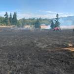 Fire officials estimate more than five acres was burned in a brush fire on July 27. Sequim Gazette photo by Matthew Nash