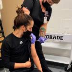 Kascia Muscutt, a soccer player and Associated Student Body president at Peninsula College, gets a COVID vaccination shot from a Jamestown Health Clinic staffer. Photo courtesy of Peninsula College