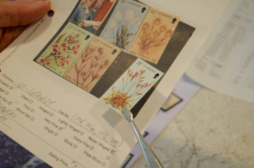 Its not uncommon for collectors to buy sets of stamps to obtain just one stamp, said Vera Felts. She bought this set of six for one lavender stamp, she said. Sequim Gazette photo by Matthew Nash