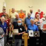 Members of the Strait Stamp Society met for the first time in-person after more than a year due to the pandemic. They host their stamp show on Saturday, Aug. 21 in the Guy Cole Event Center. Sequim Gazette photo by Matthew Nash