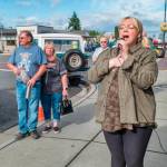 Amanda Bacon sings Star Spangled Banner to kick off Saturdays Sequim Prairie Nights event. Photo by Bob Lampert