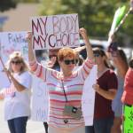 More than 100 protestors fill the corners of Washington Street and Sequim Avenue on Aug. 18. Sequim Gazette photo by Michael Dashiell