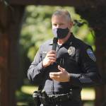 Sgt. Mike Hill of the Sequim Police Department thanks fellow essential workers at the Sequim-Dungeness Valley Chamber of Commerces annual picnic and Citizen of the Year presentation on Aug. 24. The chamber honored essential workers with its 2020 award. Sequim Gazette photo by Michael Dashiell