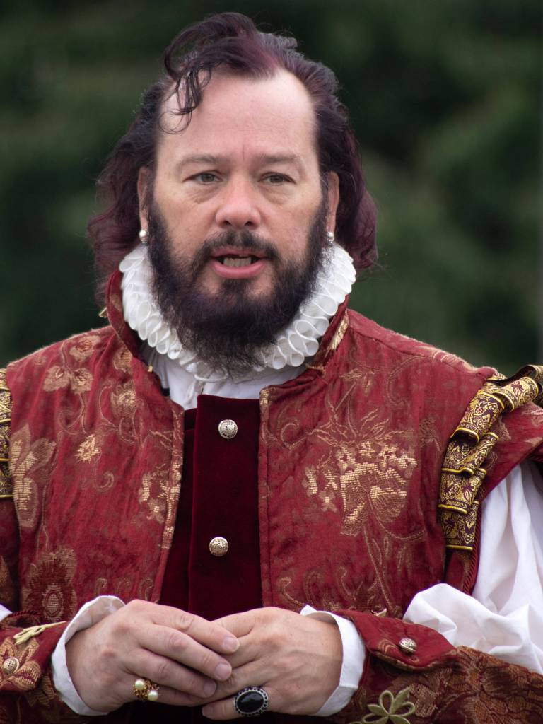 Richard Stephens, playing William Shakespeare, speaks to the audience at Olympic Theatre Arts Renaissance Festival in Sequim on Aug. 22. Sequim Gazette photo by Emily Matthiessen
