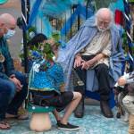 James the Obscure Hodgson, a storyteller since 1968, entertains a rapt audience on Aug. 22 in the parking lot of Olympic Theatre Arts in Sequim during their Renaissance Fair fundraiser. Sequim Gazette photo by Emily Matthiessen