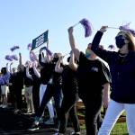 Sequim School District staff lead cheers of Team Sequim, Kids Win at a pre-school year, all-school staff rally on Aug. 23 at the districts sports stadium. The district is planning on welcoming back students for in-person instruction on Wednesday, Sept. 1. Sequim Gazette photo by Michael Dashiell