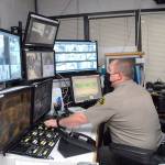 Deputy Rick Bray watches surveillance monitors from the control room at the Clallam County Jail on Aug. 25 in Port Angeles. Photo by Keith Thorpe/Olympic Peninsula News Group