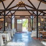 The interior of the converted horse barn at Fox-Bell Events in Port Angeles is set up for a wedding. Sequim Gazette photo by Emily Matthiessen