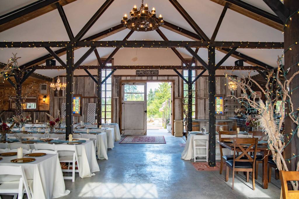 The interior of the converted horse barn at Fox-Bell Events in Port Angeles is set up for a wedding. Sequim Gazette photo by Emily Matthiessen