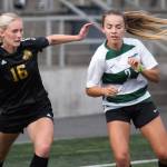 Peninsula Colleges Millie Long, left, a former Port Angeles High standout, vies for the ball in an 11-0 rout of Chemeketa on Aug. 25 in Tukwila. See season previews of both PC men and womens teams online at sequimgazette.com.
Photos by Rick Ross/Peninsula College