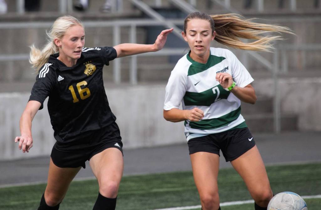 Peninsula Colleges Millie Long, left, a former Port Angeles High standout, vies for the ball in an 11-0 rout of Chemeketa on Aug. 25 in Tukwila. See season previews of both PC men and womens teams online at sequimgazette.com.
Photos by Rick Ross/Peninsula College