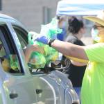 Gabriel Allen hands out free lunches to attendees of the 2021 Back to School Fair on Aug. 28. Sequim Gazette photos by Michael Dashiell