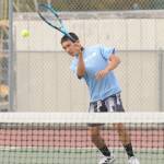 Sequims Koda Robinson, pictured here volleying a shot at a preseason practice, figures to be Sequims No. 3 singles player behind Garrett Little and Connor Bear, coach Mark Textor said.