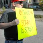 Jerry Ludke holds a sign admonishing Dr. Allison Berry, the health officer for Clallam and Jefferson counties, during a rally against vaccine mandates on Sept. 3 in Port Angeles. Photo by Keith Thorpe/Olympic Peninsula News Group