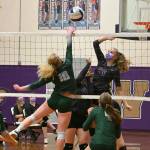 Sequims Jolene Vaara, right and Malory Morey look to block a shot by Port Angeles Kennedy Bruch in the Wolves 3-1 win over the Roughriders on Sept. 9. Sequim Gazette photo by Michael Dashiell